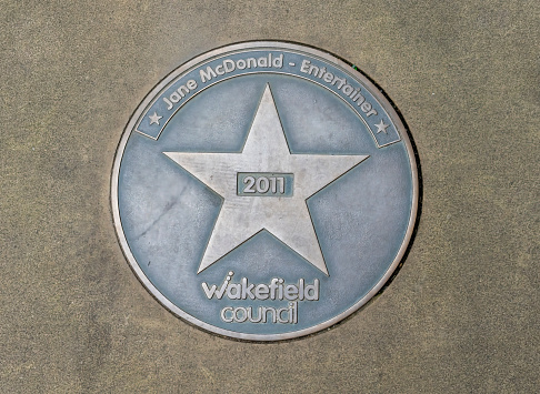 Wakefield Star on Walk of Fame.  This is in the centre of Wakefield, Yorkshire, England, UK on the pavement and is for Jane McDonald, TV presenter and singer made famous by the Documentary about a Cruise ship.