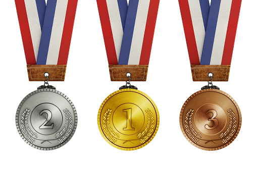 Gold, silver and bronze medals with ribbons isolated on white.