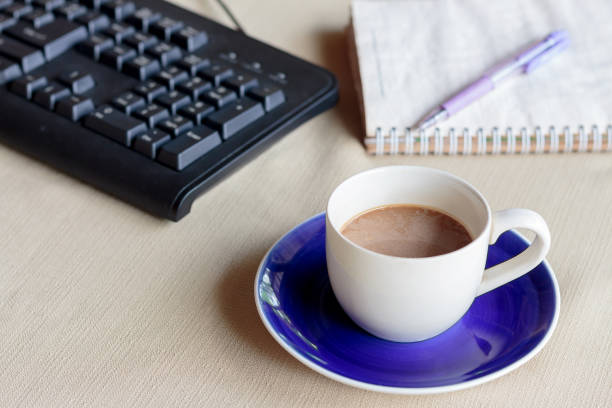 istock coffee in white cup on saucer 1404883728
