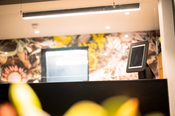 istock Selective focus self service check in screen at luxury hotel reception 1404886942