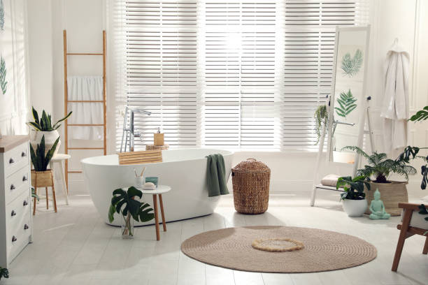 istock Stylish bathroom interior with green plants. Home design 1404887979