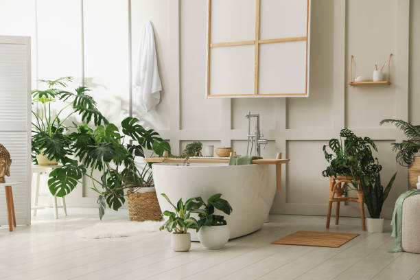 istock Stylish bathroom interior with green plants. Home design 1404887981