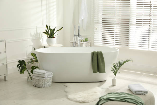 istock Stylish bathroom interior with green plants. Home design 1404888280