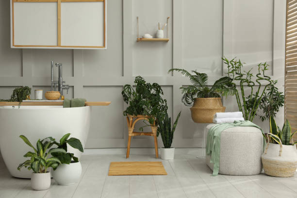 istock Stylish bathroom interior with green plants. Home design 1404888306