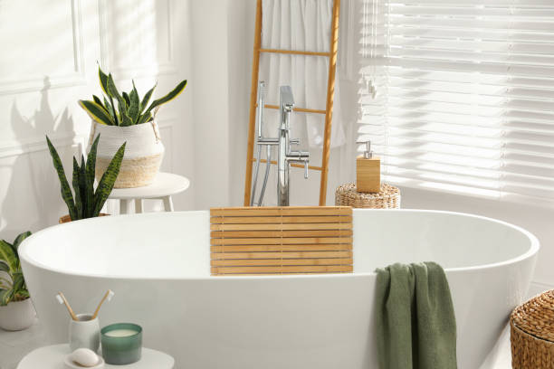 istock Stylish bathroom interior with green plants. Home design 1404888357
