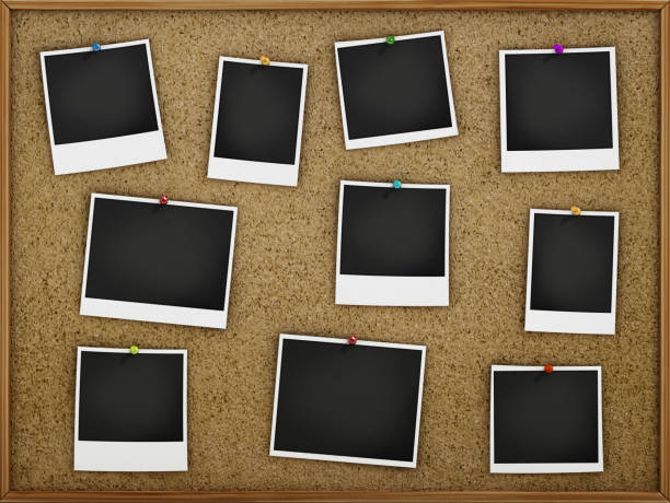 istock Instant photograph frames and pushpins on the corkboard 1404888417