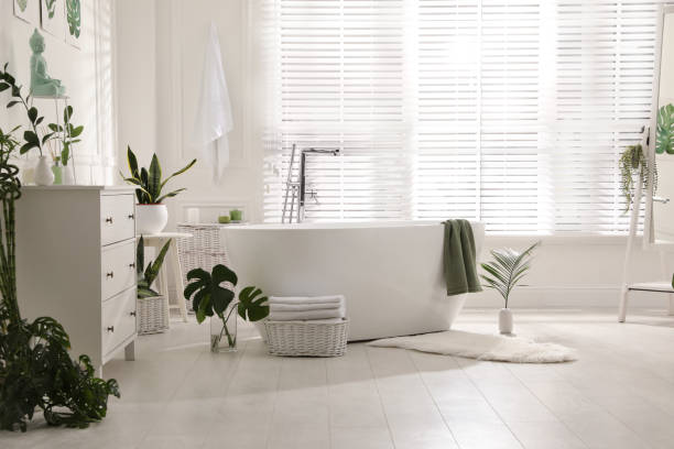 istock Stylish bathroom interior with green plants. Home design 1404888627