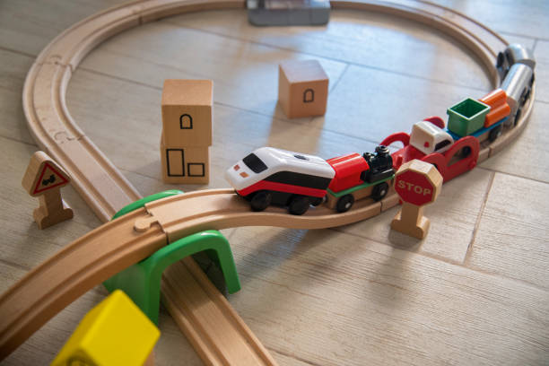 istock Wooden toy train on track 1404888652