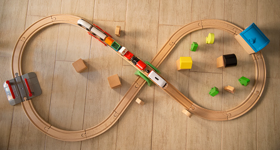 Top view of toy train on track. High quality photo