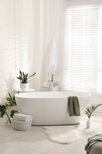 istock Stylish bathroom interior with green plants. Home design 1404889271