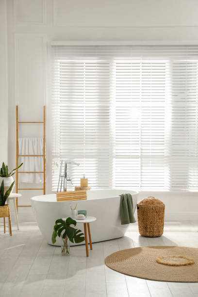 istock Stylish bathroom interior with green plants. Home design 1404889357