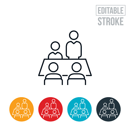 An icon of a business person standing and speaking to co-workers seated at conference table. The icon includes editable strokes or outlines using the EPS vector file.