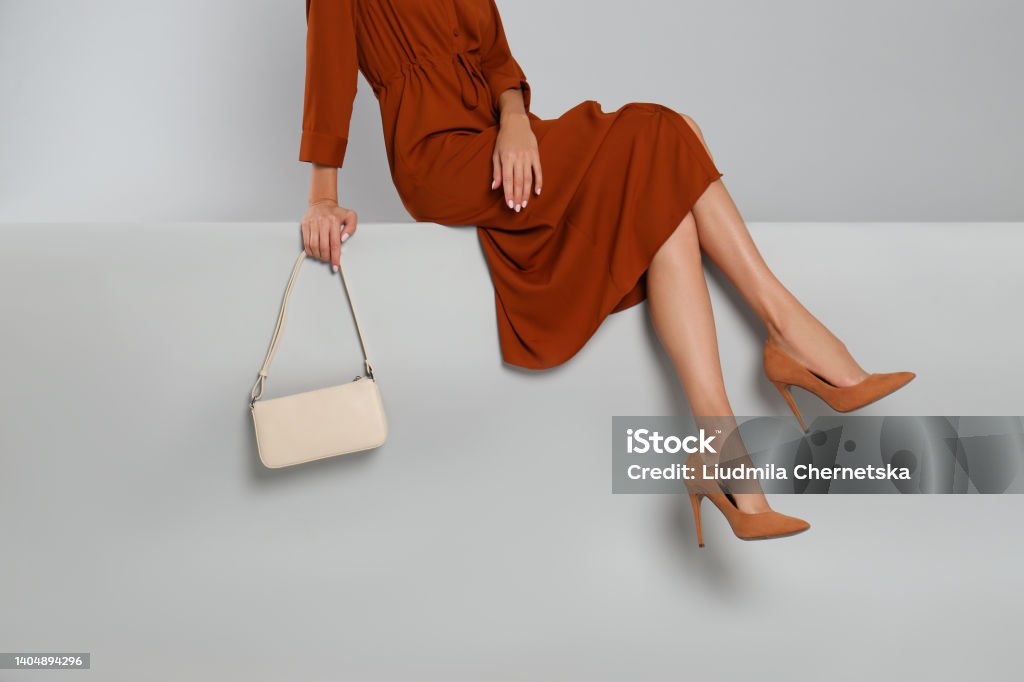 Woman with stylish bag on grey background, closeup Shoe Stock Photo