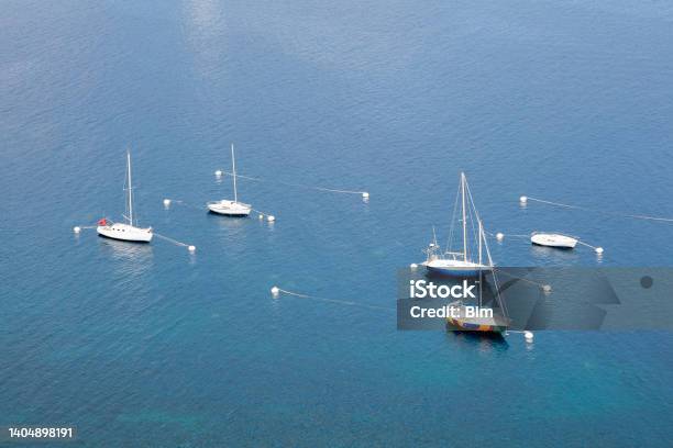 Five Sailboats Moored On Mediterranean Sea Capdail Cote Dazur French Riviera Stock Photo - Download Image Now