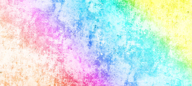 istock Abstract colorful rainbow colors painted colored grunge stone concrete cement blackboard chalkboard wall floor texture background banner panorama LGBT 1404900503