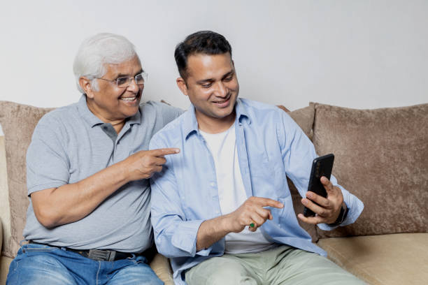 istock Father son Having fun together at home, candid moments 1404907255