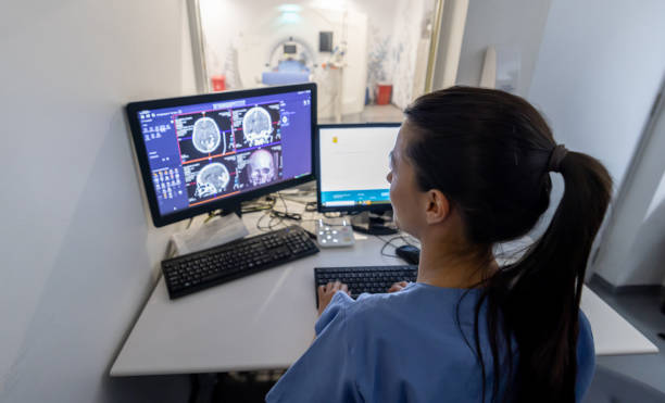 istock Radiologist in the control room performing an MRI scan 1404912335