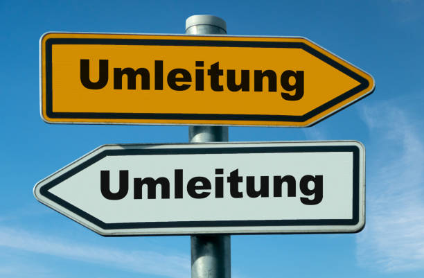 istock Two traffic signs show diversion 1404915109