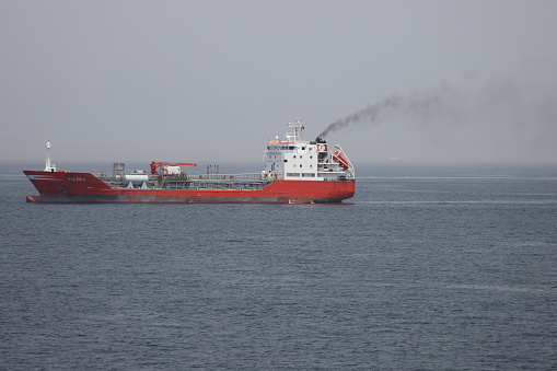 6th June 2022: Oil tanker off the coast of Gibraltar with polluting exhaust smoke being emitted from its funnel