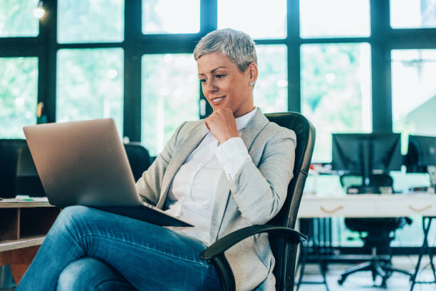 istock Businesswoman with laptop 1404926675
