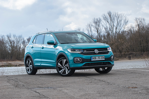 Berlin, Germany - 14th March, 2020: Volkswagen T-Cross stopped next to the river. The T-Cross is the smallest crossover/SUV in Volkswagen offer.