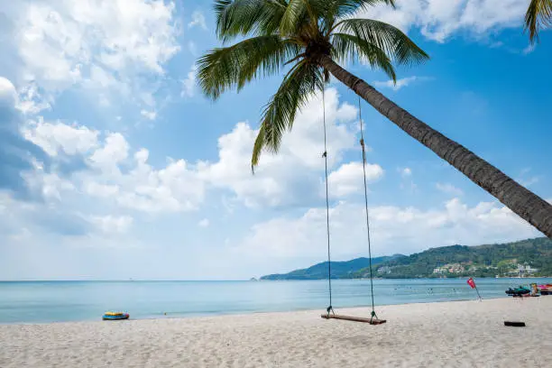 Patong Beach in Phuket Island, the most popular beach in the resort town of Phuket island, Thailand. Patong beach landscape for vacation, holiday, travel