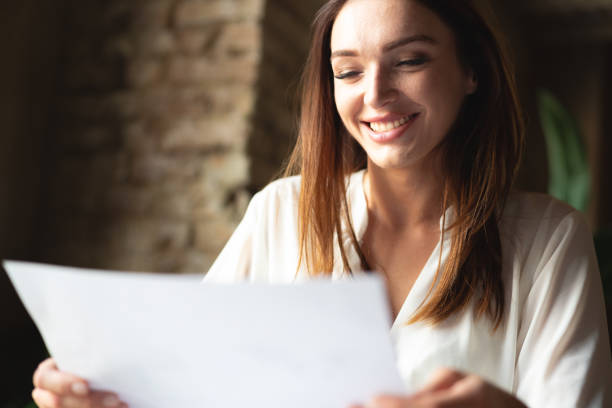 istock Young businesswoman smiling for goals achieved at work 1404931851