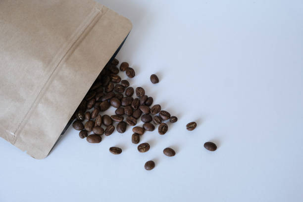 istock coffee packaging and coffee beans on a white background 1404938396