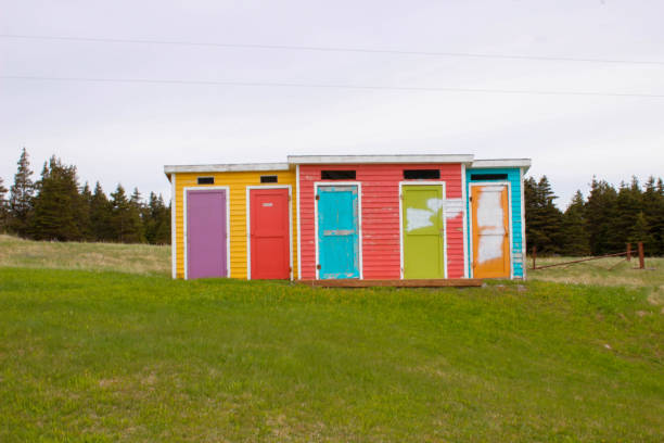 istock Colourful outhouses along a hike in Cows Head Newfoundland 1404938482