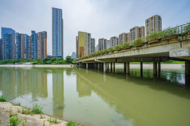 Sunny riverside bridge and Financial City