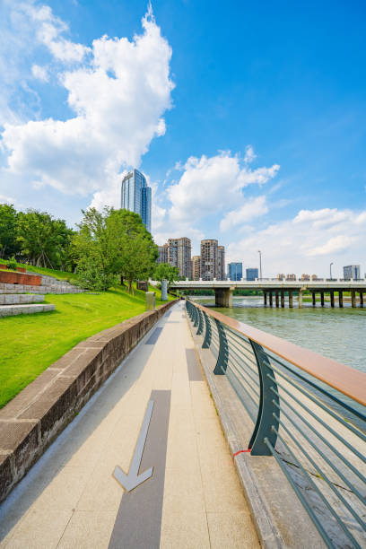 istock Sunny riverside bridge and Financial City 1404938631