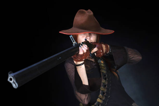 istock wild west girl with rifle 1404942653