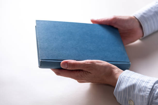 istock closed book hardcover, antique, copy space, reading, books, education concept, selective focus 1404952361