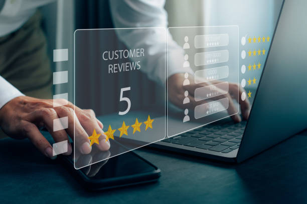 istock User give rating 5 star to service experience on online application. 1404971158