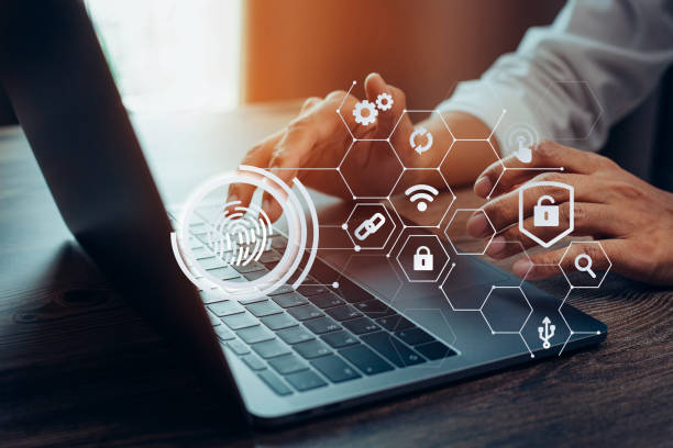 istock Businessmen protecting personal data on laptop and virtual interfaces 1404971161