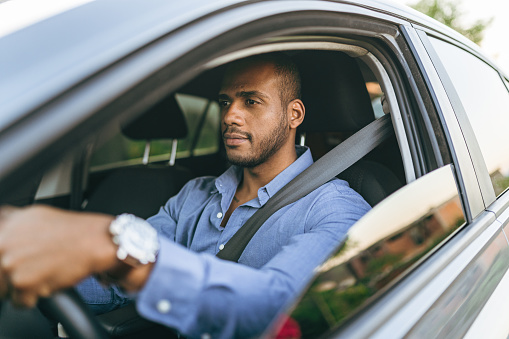 Business man driving a car