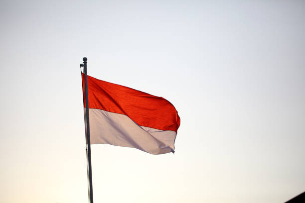 istock Indonesian flag flying at the pole 1404973283