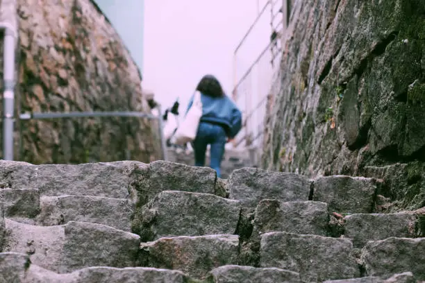 Amazing pathway from stone steps so ancient at Song Lo uphill, Da Lat, Viet Nam, impression walkway from old rock