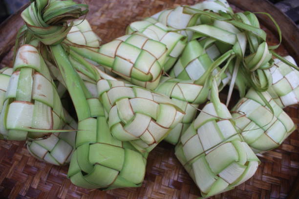 istock one of the dishes that are often found during Eid, ketupat 1404978869