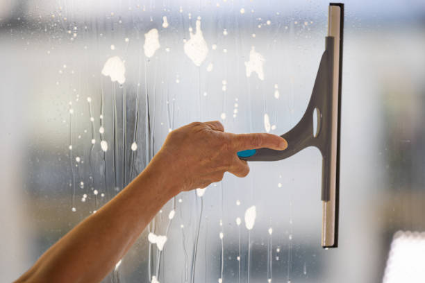 istock A woman cleans windows 1404980753