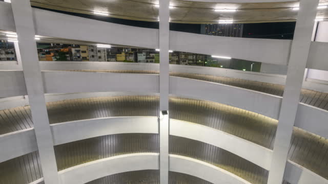 Time lapse of Circular ramp in parking garage Spiral shaped at night