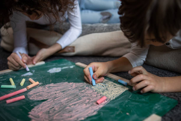 istock We like to draw with chalk on the board 1404992875