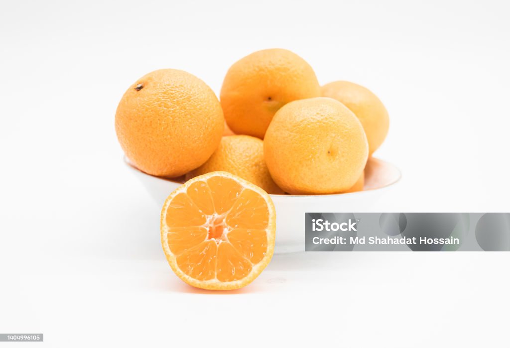 whole and slice Tangerine or kamala isolated on white background Bangladesh Stock Photo