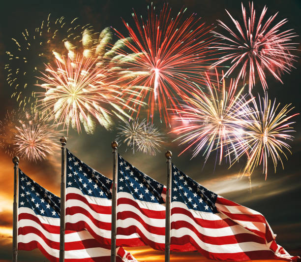 istock fourth of july celebration with fireworks and flags 1404999130