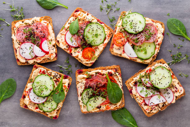 istock Sandwiches with cream cheese, vegetables and salami. 1405000676