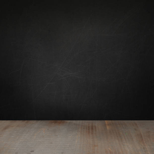 istock Empty blackboard wall and wooden floor background 1405000678