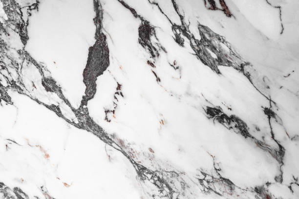 istock White marble stone texture top view. abstract pattern with grey and brown streaks for background or design art 1405001587