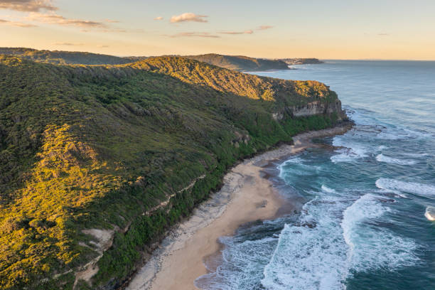 Dudley Beach - Towards Newcastle Aerial view of cliff line at Dudley Beach - Newcastle Australia, looking north towards Merewether and the city area. newcastle australia stock pictures, royalty-free photos & images