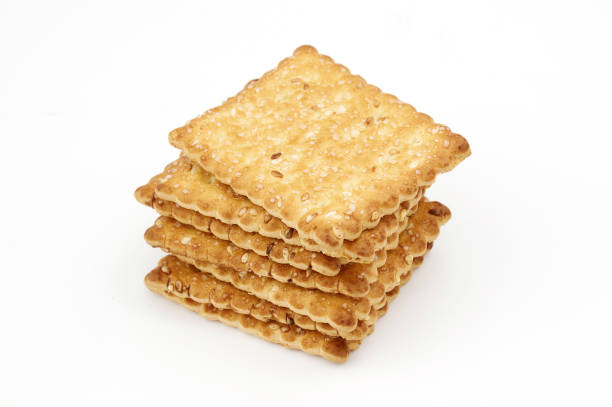 istock Crispy cracker according to recipes. Sweet cookies on a bun background 1405003024
