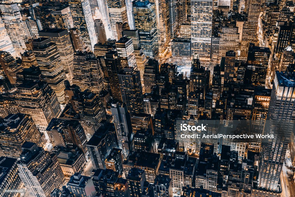 Aerial View of Manhattan at Night / NYC Aerial View of Buildings in Manhattan at Night / NYC New York City Stock Photo